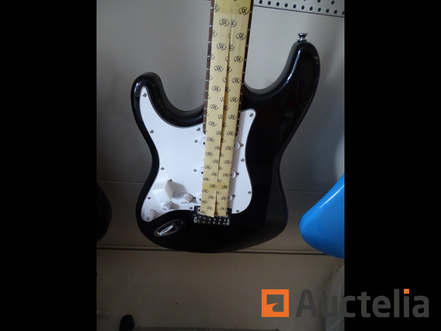 Guitare électrique gaucher SX SE15KL + ampli GA-1065 - Instrument